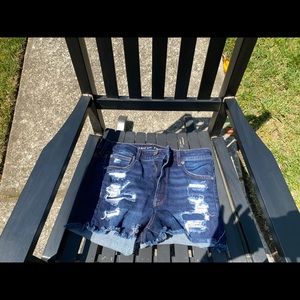 Dark wash distressed jean shorts